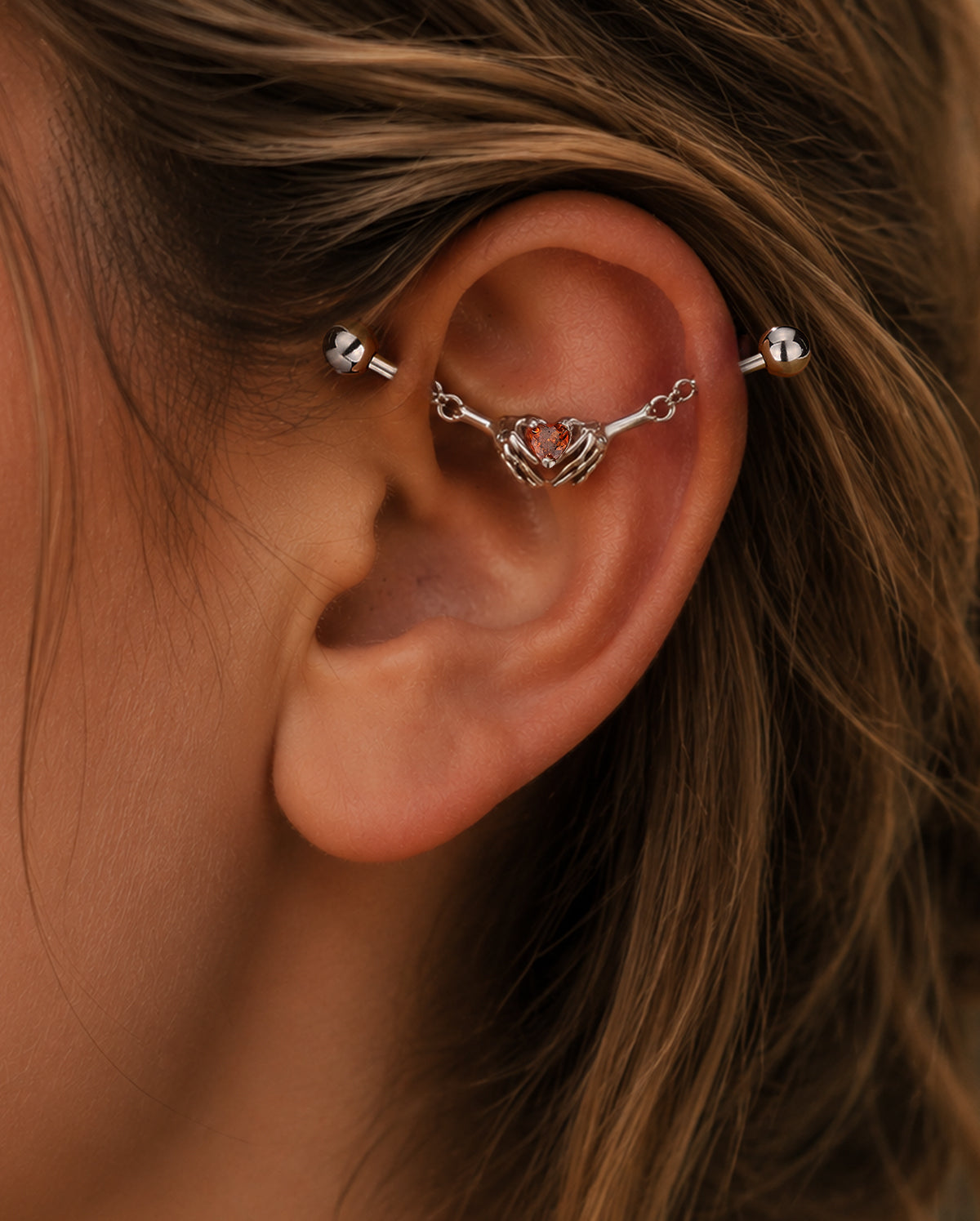 Skeleton Hands Industrial piercing