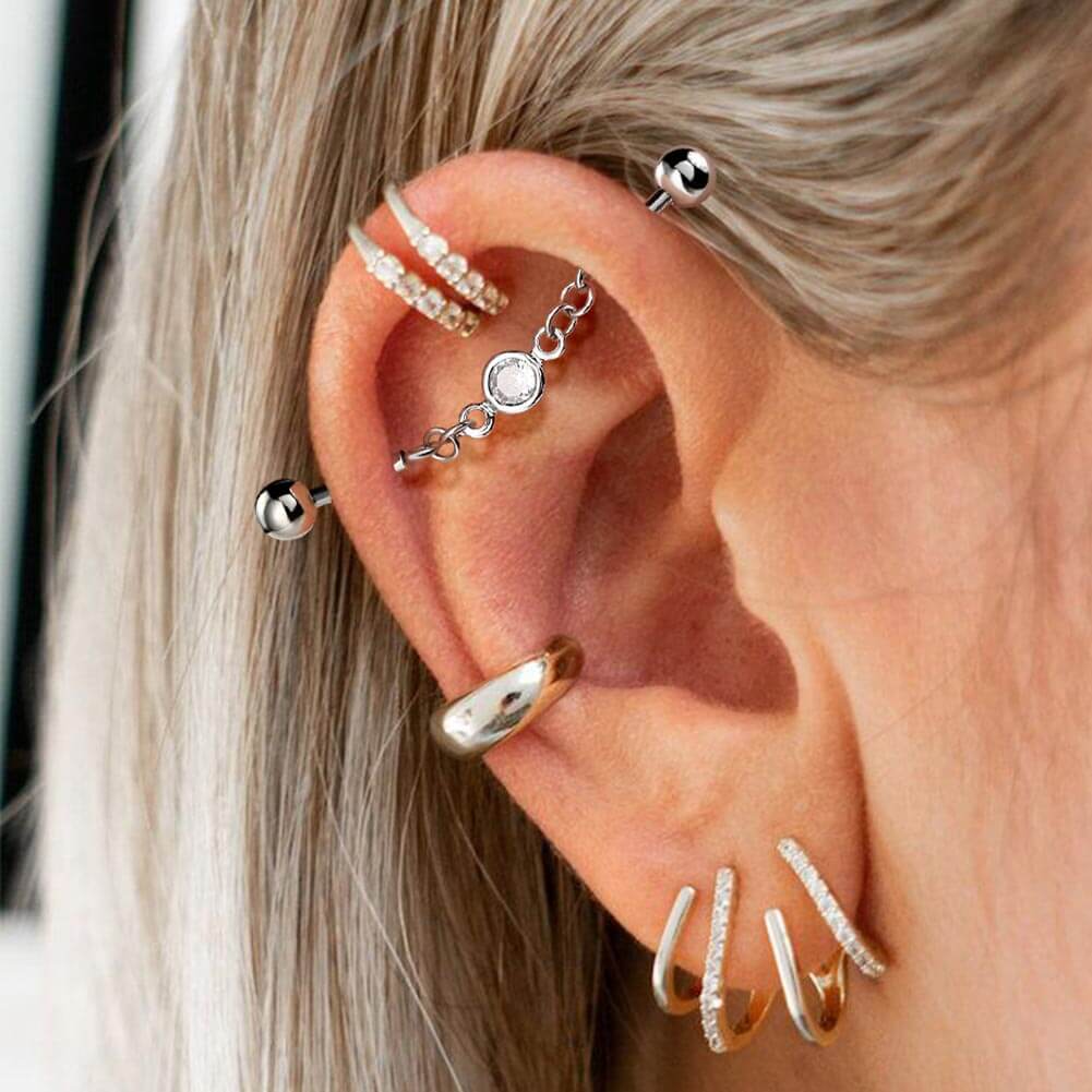 industrial barbell chain piercing