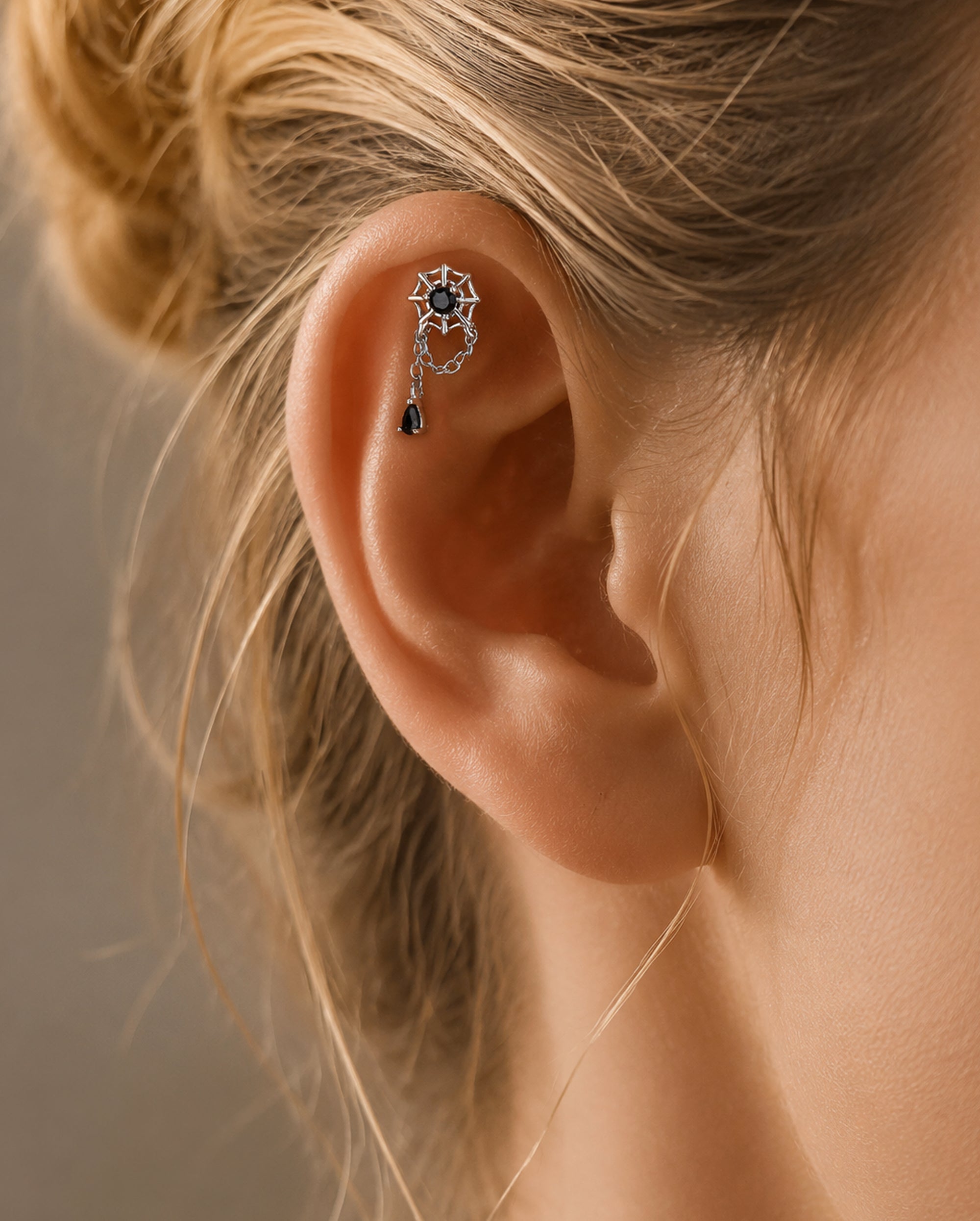 spider cartilage piercing