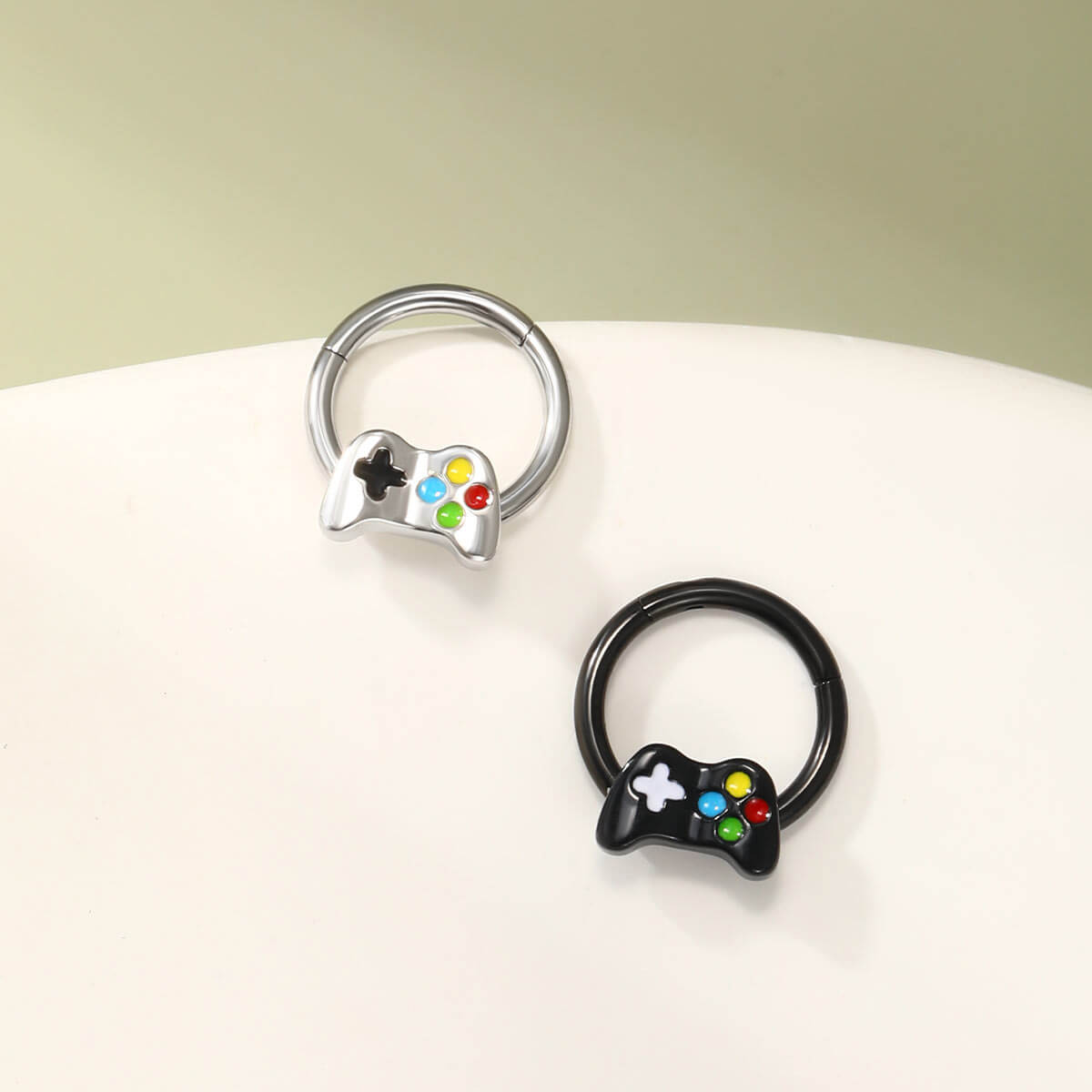 hinged game controller septum ring