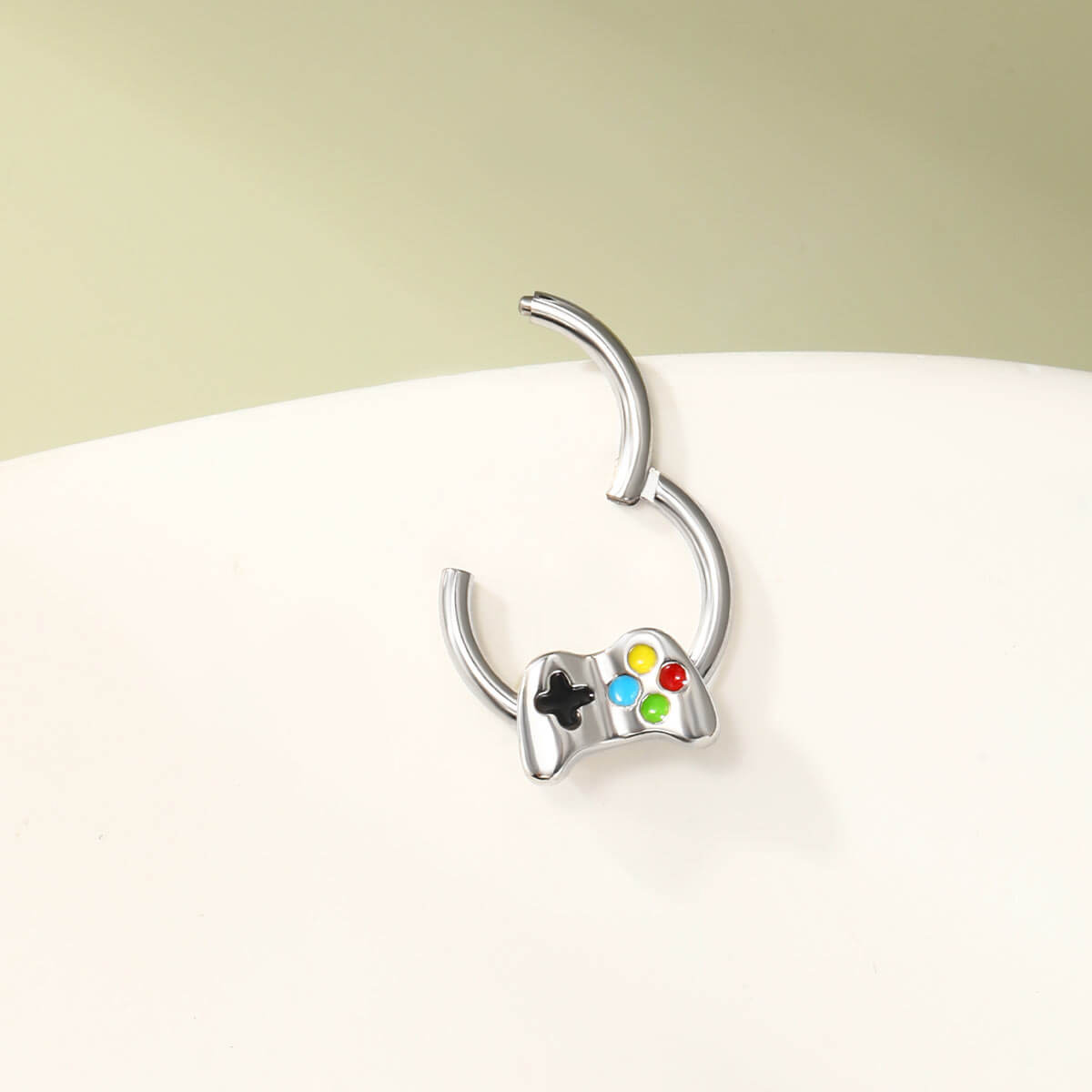 hinged game controller septum ring