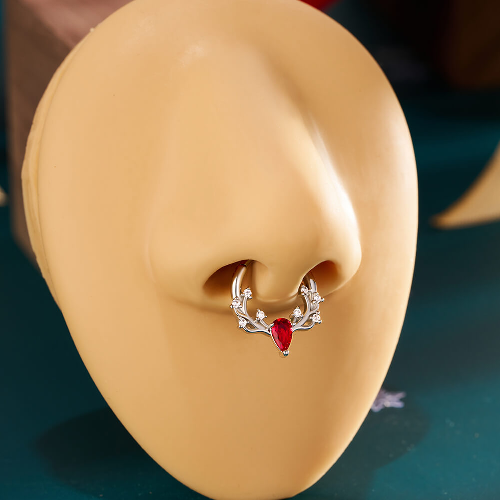 red gemstone septum ring