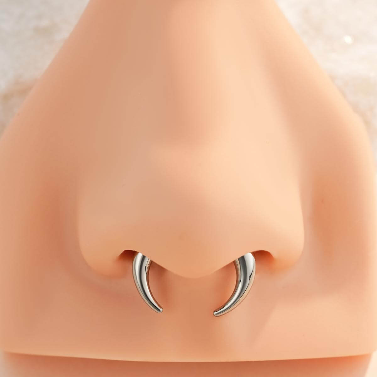 fake gauge septum piercing