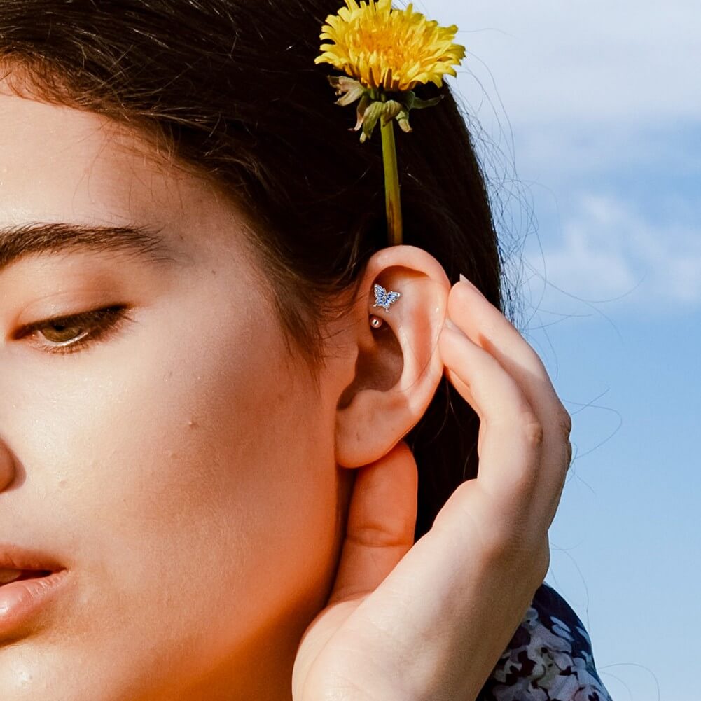 blue butterfly rook piercing