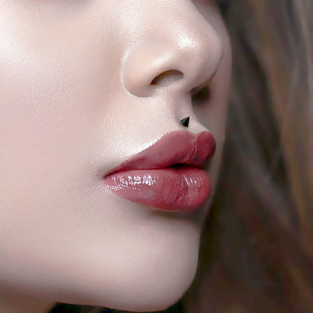 black spike labret piercing