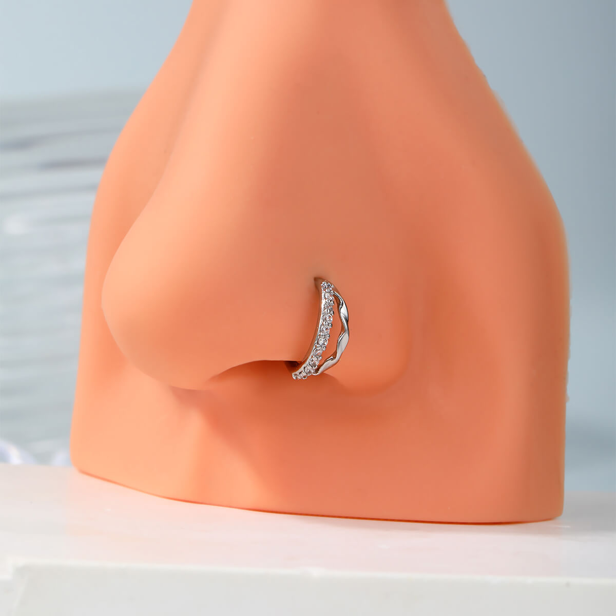 waved CZ nose piercing