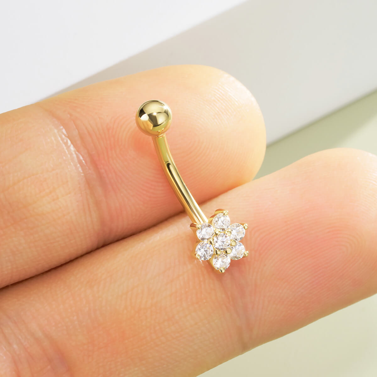 solid gold snowflake belly ring