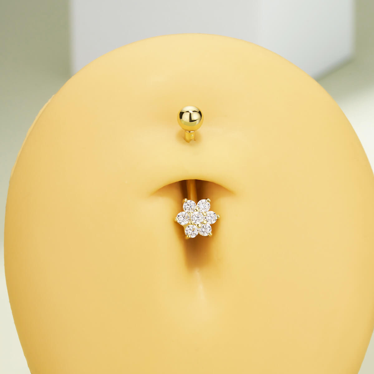 snowflake belly button piercing