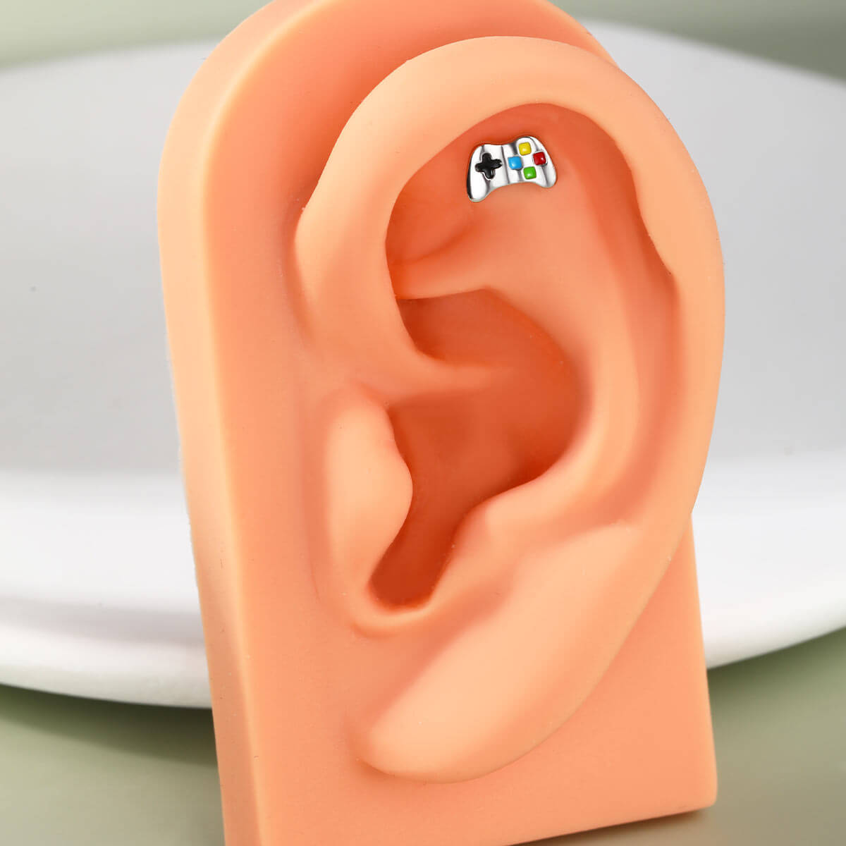 game controller cartilage piercing
