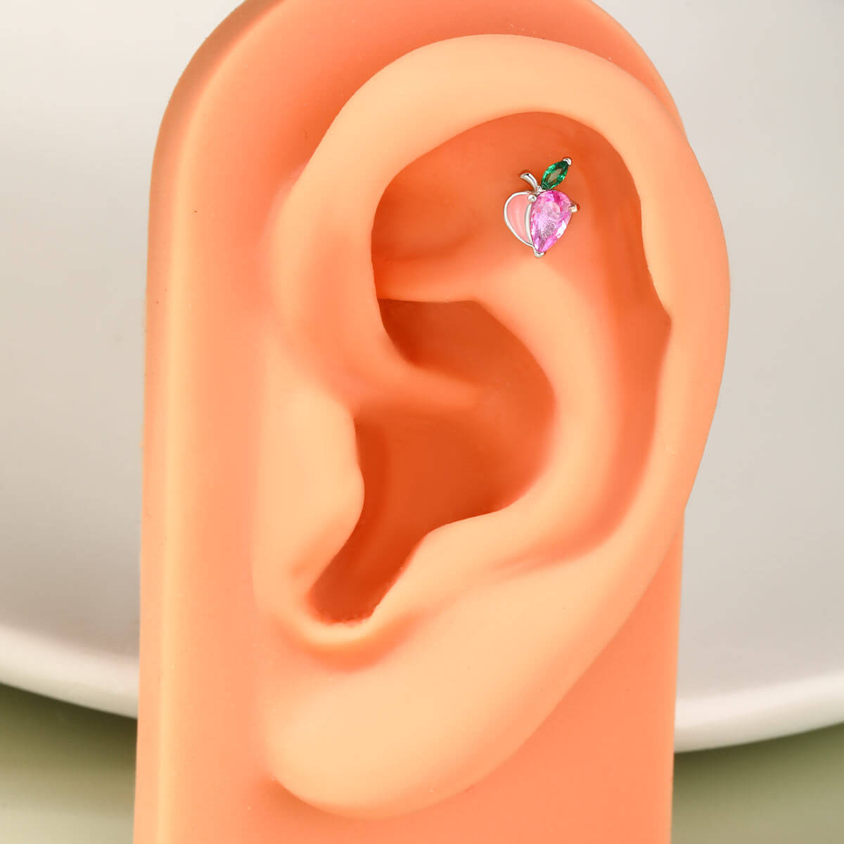 pink cartilage piercing 
