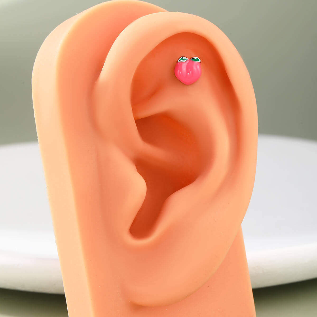 Peach cartilage piercing