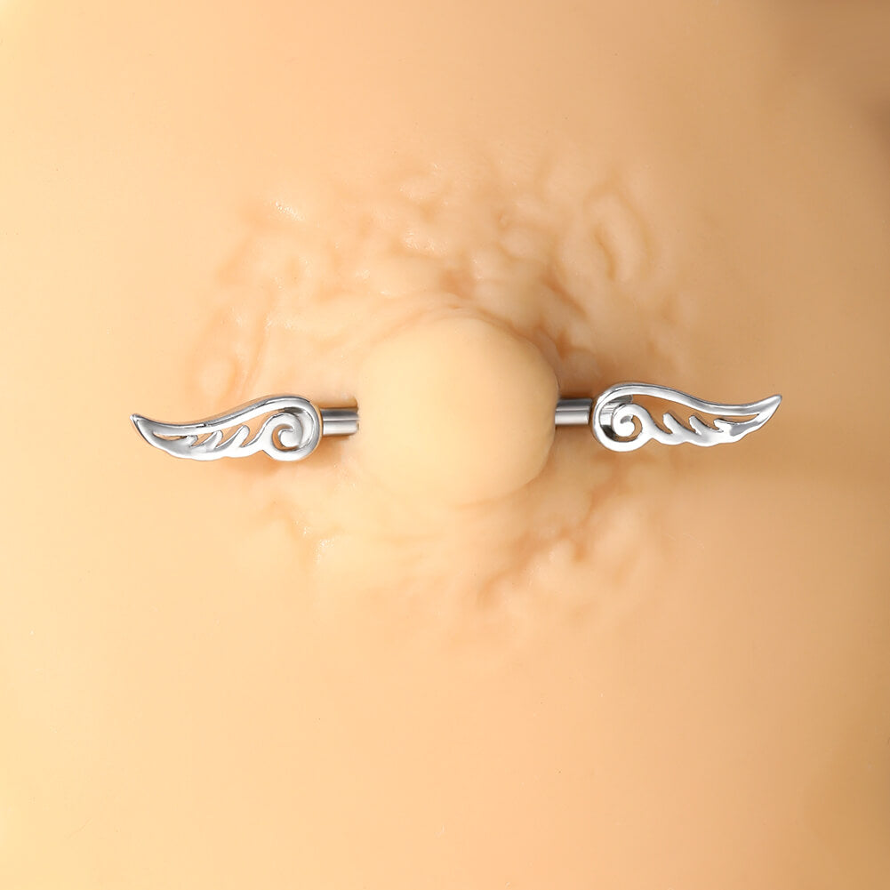 wing nipple piercing