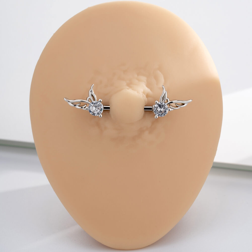 wing nipple piercing