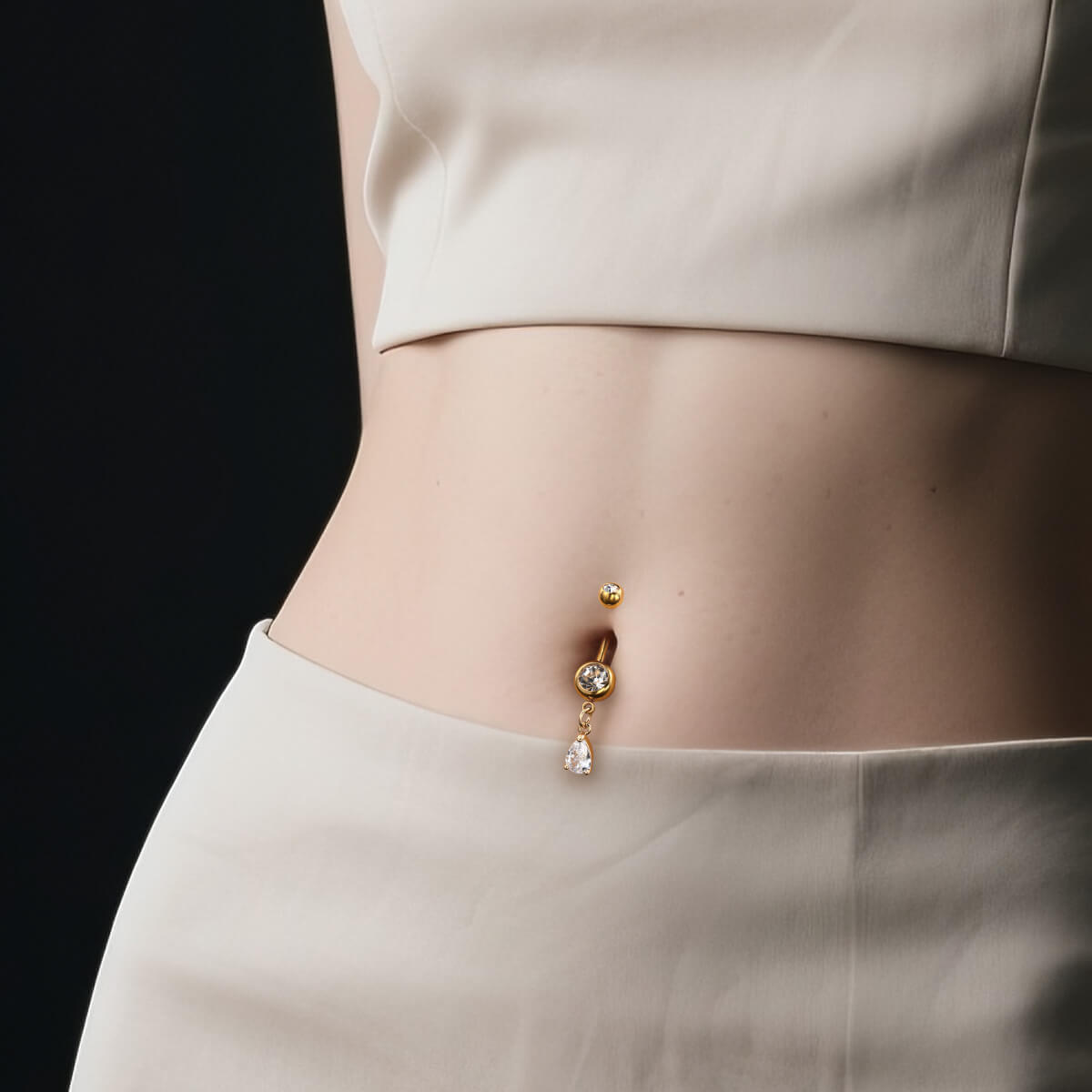 gold belly button piercing