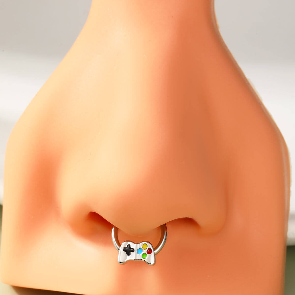 game controller septum piercing