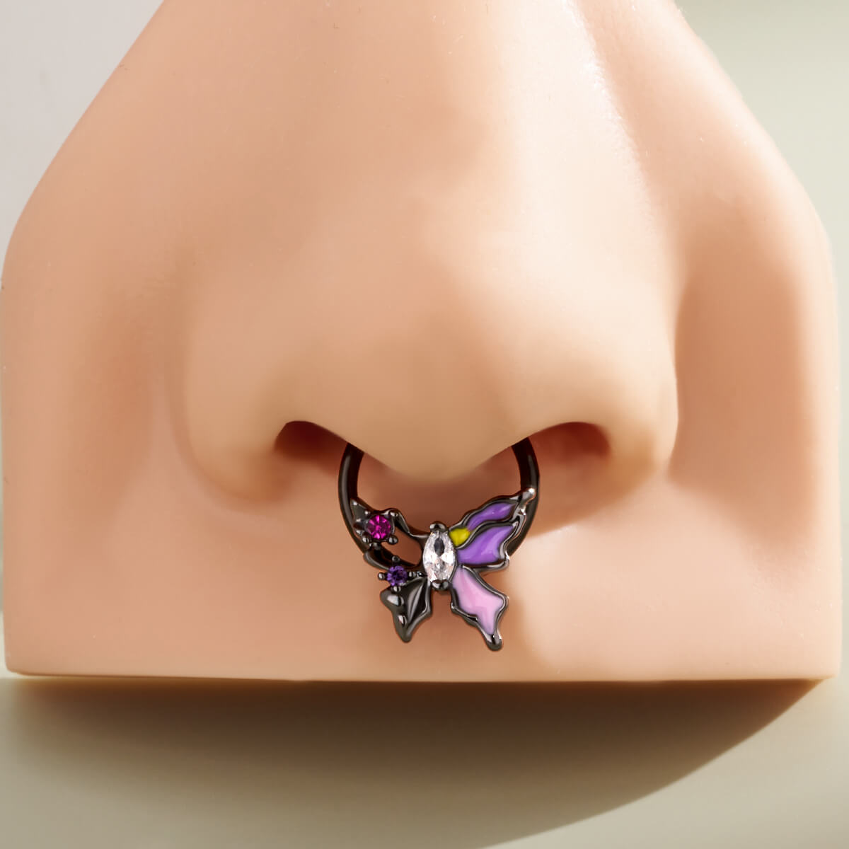 black purple butterfly septum piercing