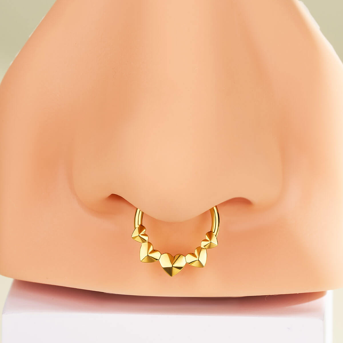 gold heart septum piercing