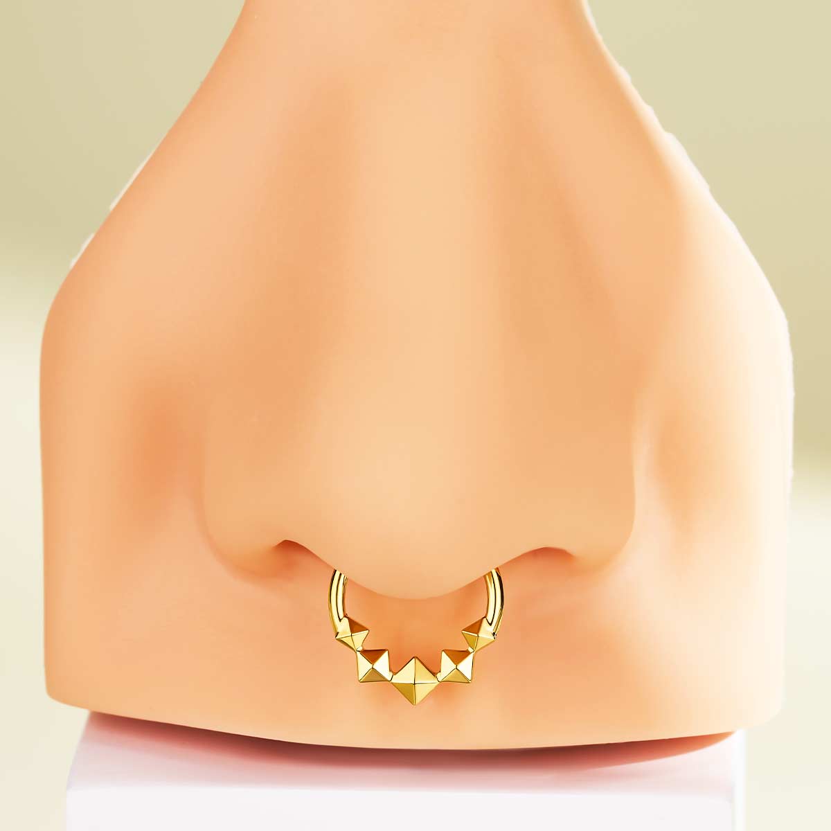 gold square septum piercing