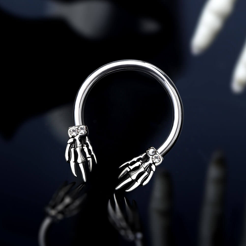 skull hand horseshoe septum ring 