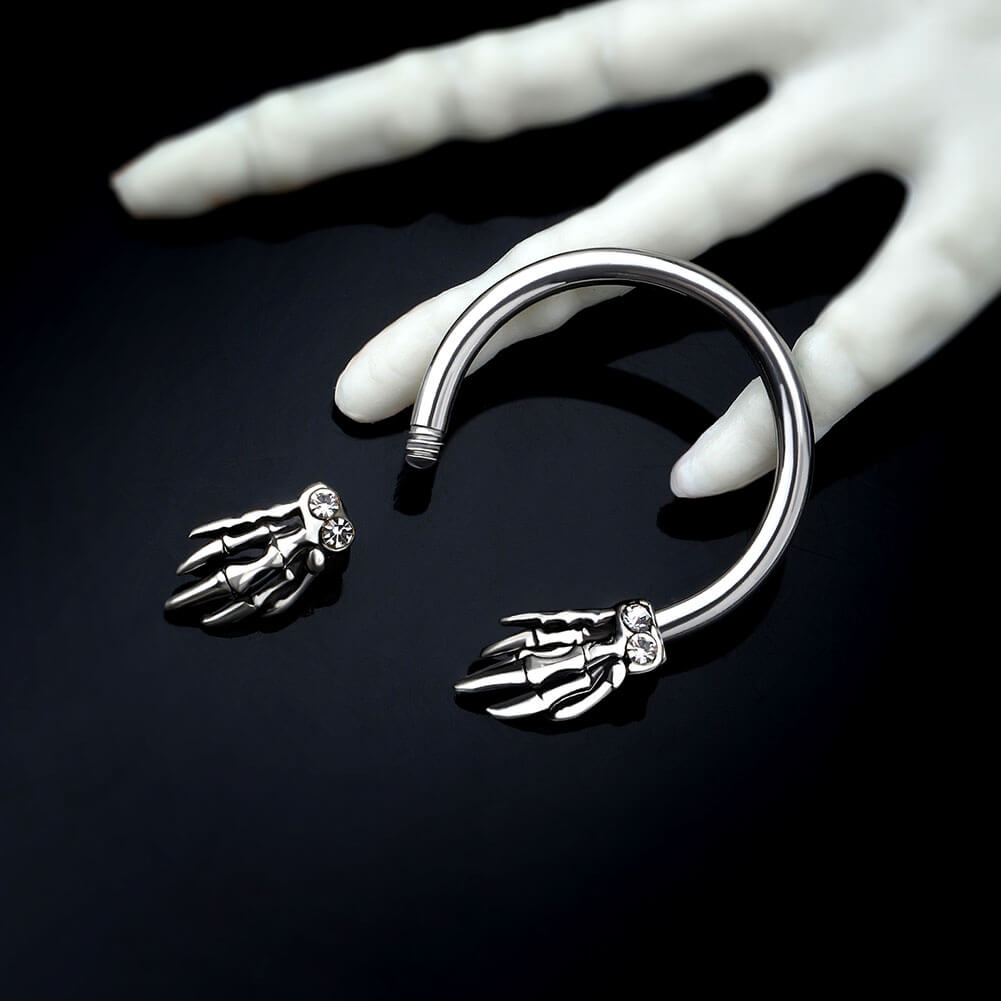 skull hand horseshoe septum ring