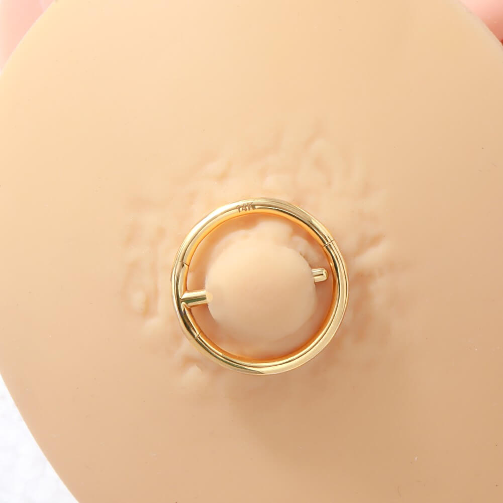 nipple hoop piercing