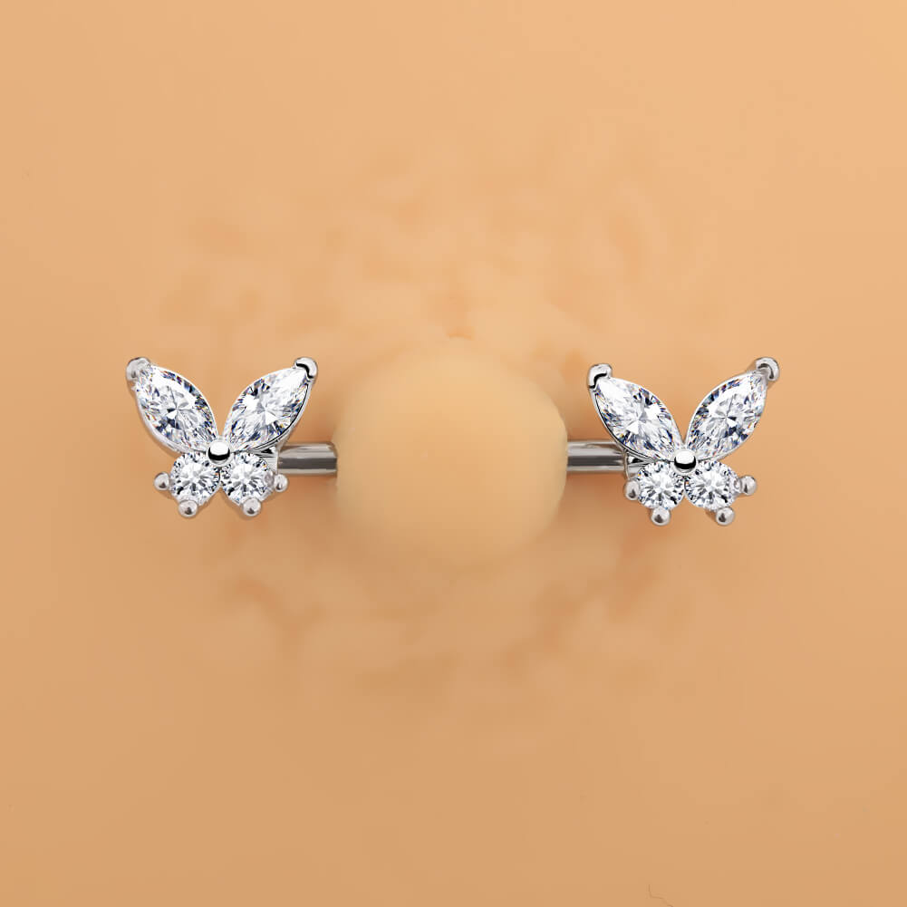 silver butterfly nipple piercing