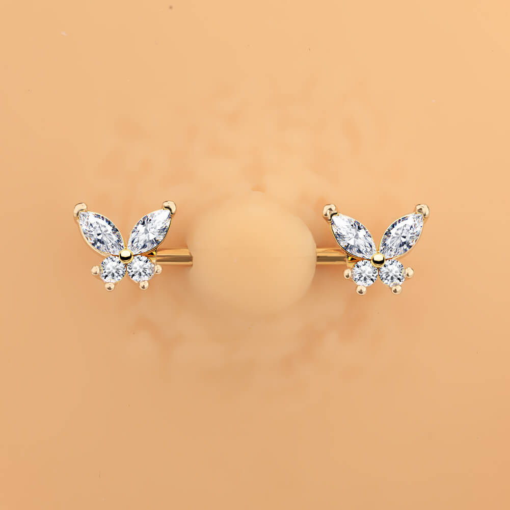 gold butterfly nipple piercing