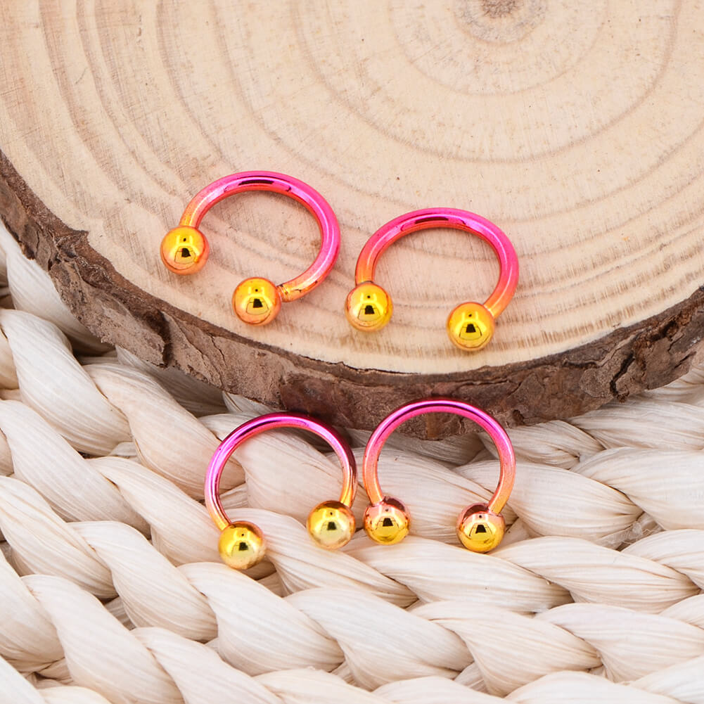 3/8'' Pink and Yellow horseshoe septum rings