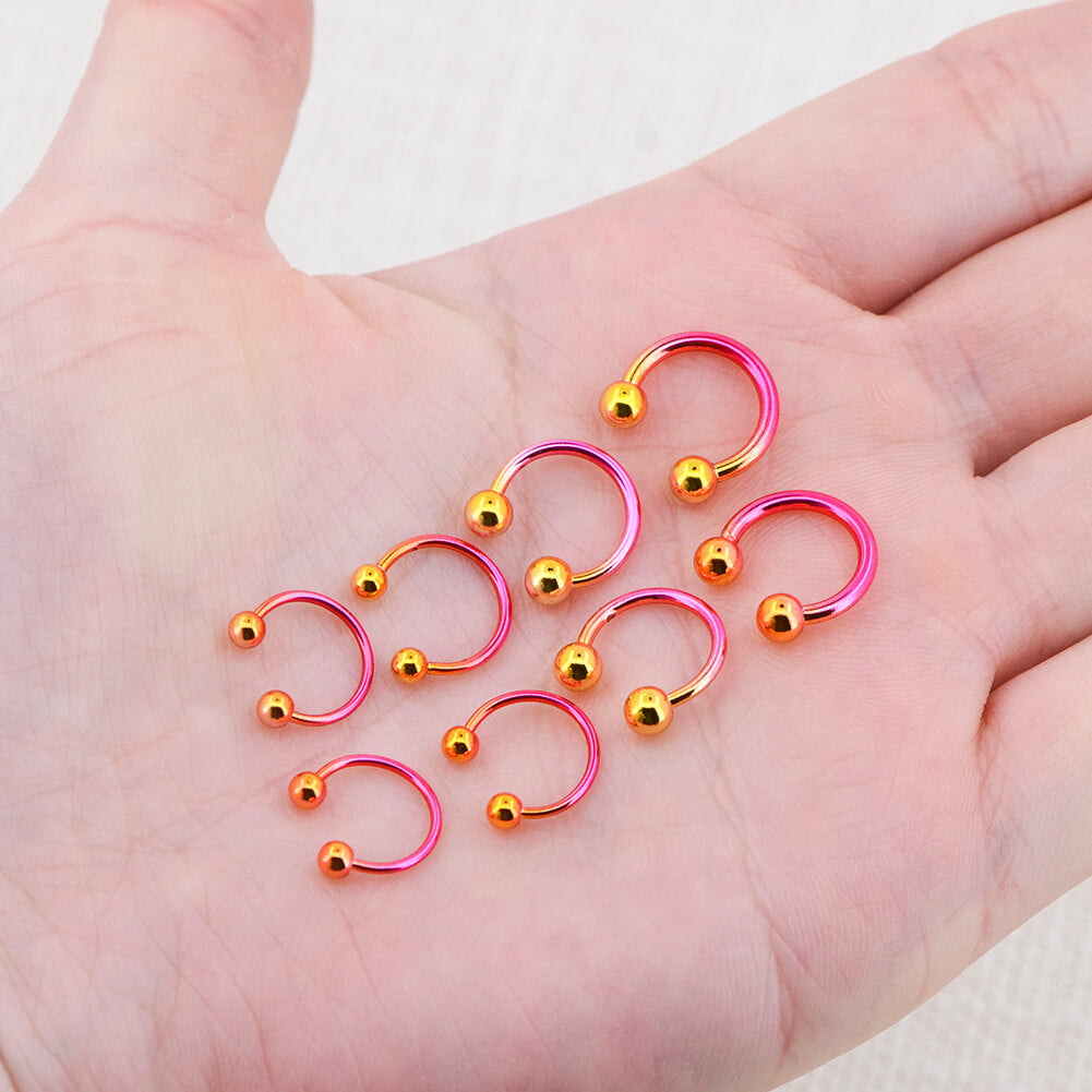 pink-yellow horseshoe septum rings 
